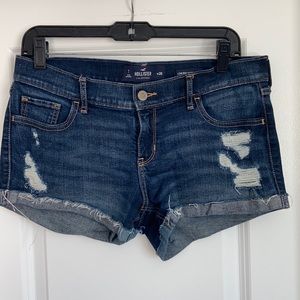 Distressed denim shorts.